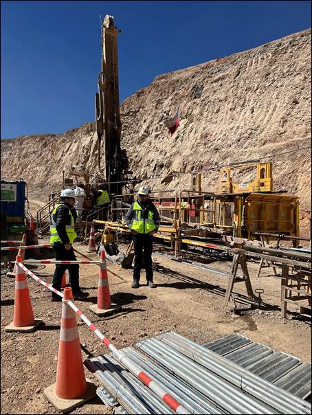 A group of people standing next to a construction site

AI-generated content may be incorrect.